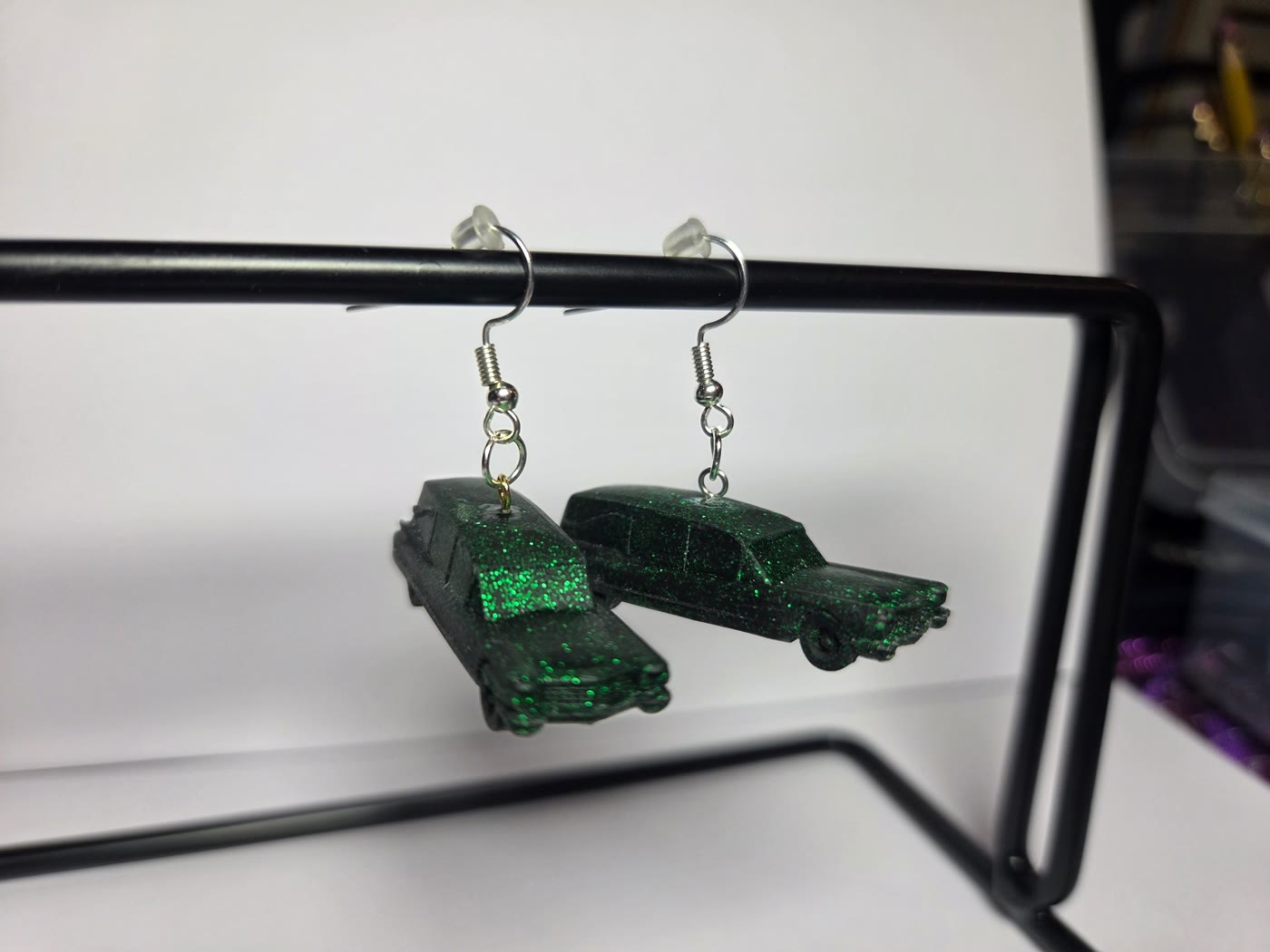 Green glitter hearse earrings