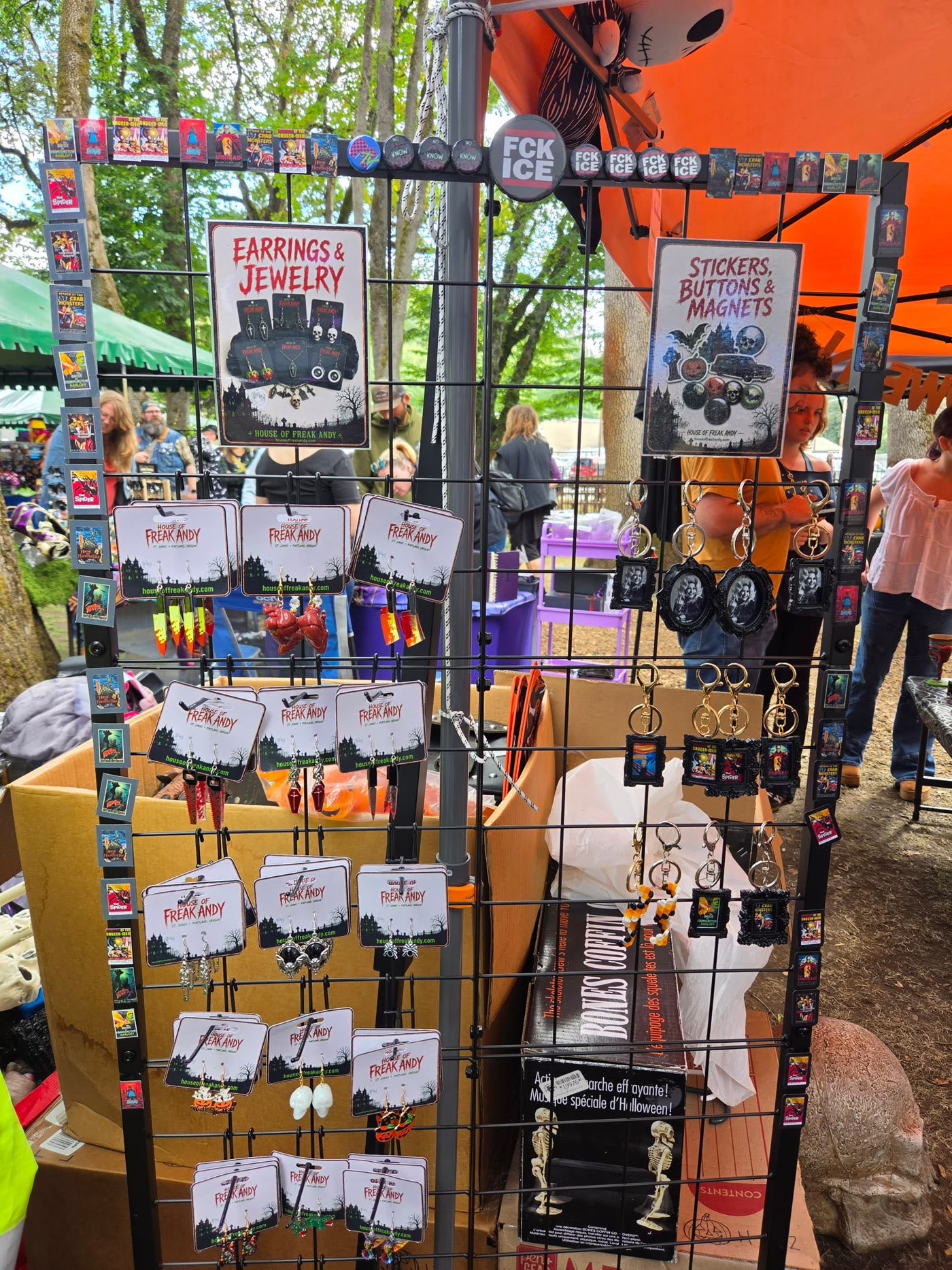 Our display of handmade earrings, jewelry and keychains