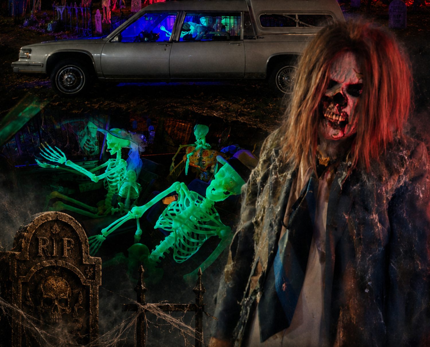 House of Freak Andy haunted cemetery display at night